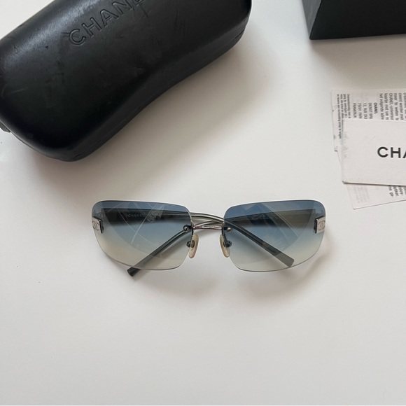 CHANEL Accessories - Chanel blue rimless sunglasses